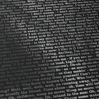 Close up detail of a black and white typographic portrait of Bob Marley, created from his song lyrics.