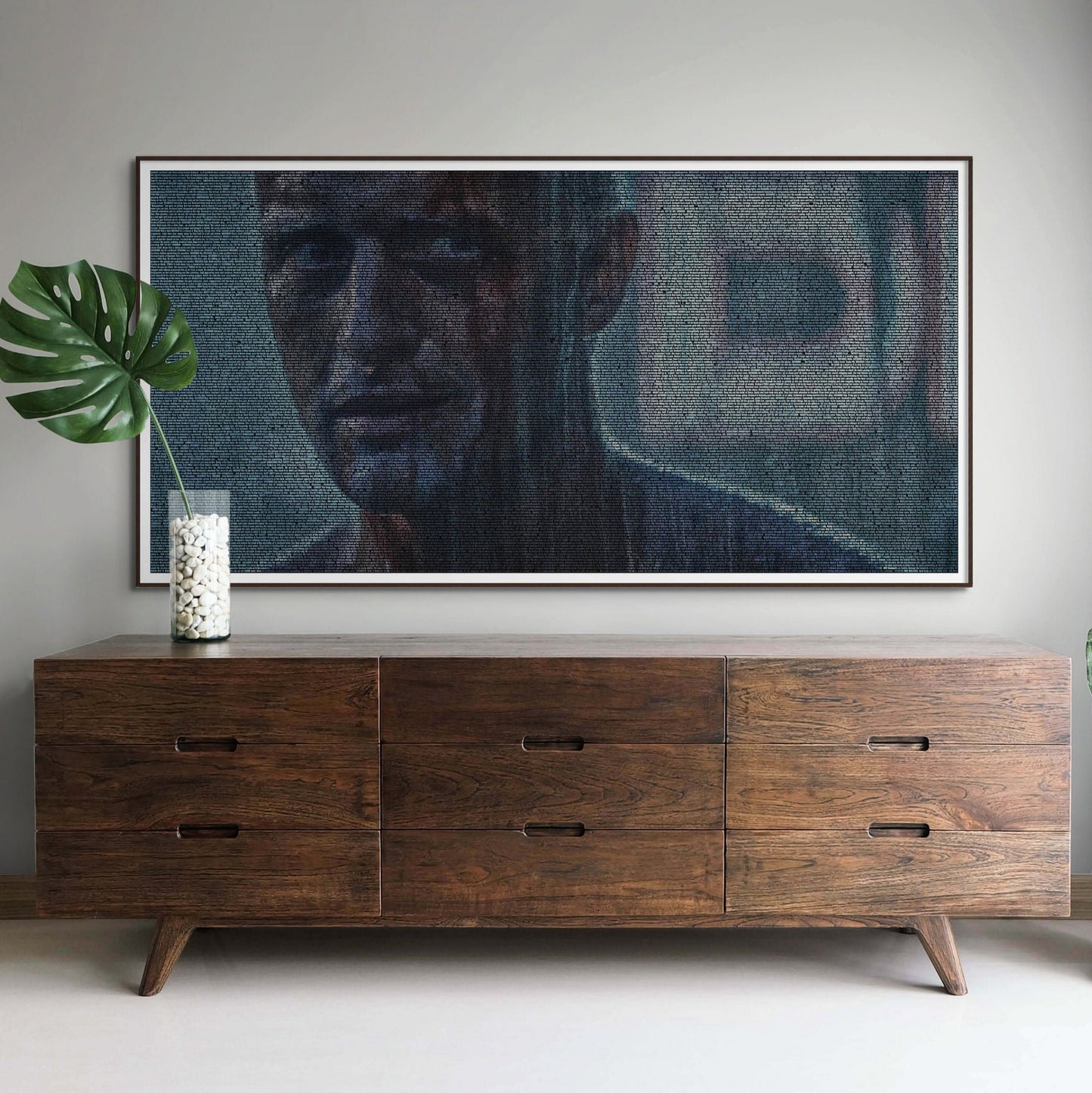 A framed portrait of Roy Batty, typographically created from the Blade Runner screenplay. In a home setting.