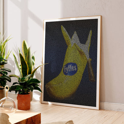 A framed art print featuring Billy Connolly's Big Banana Boot