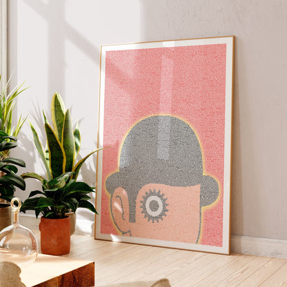 A Clockwork Orange poster, framed in a sunlit room beside plants
